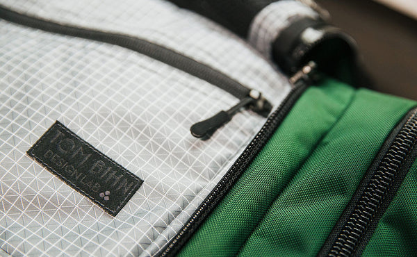 Design Lab Edition Packing Cube Shoulder Bag being packed in an Aeronaut 45 travel bag.